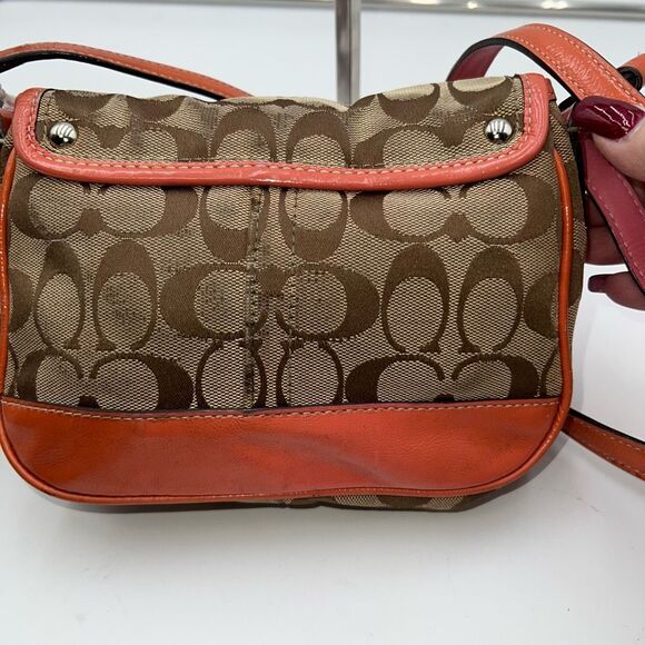 Coach Legacy Signature Canvas Crossbody Bag with a turn-lock closure. - Picture 9 of 11